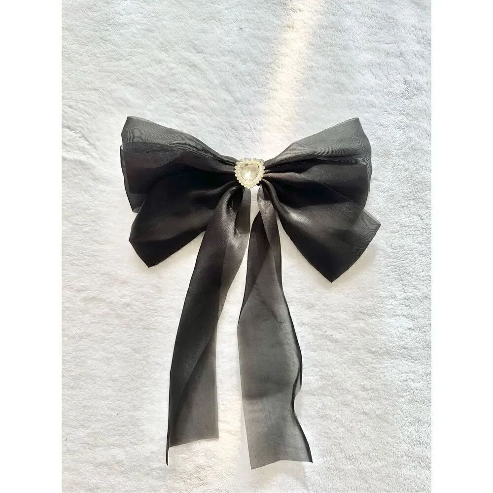 Black sheer shiny hair bow with rhinestone heart with pearl embellishment